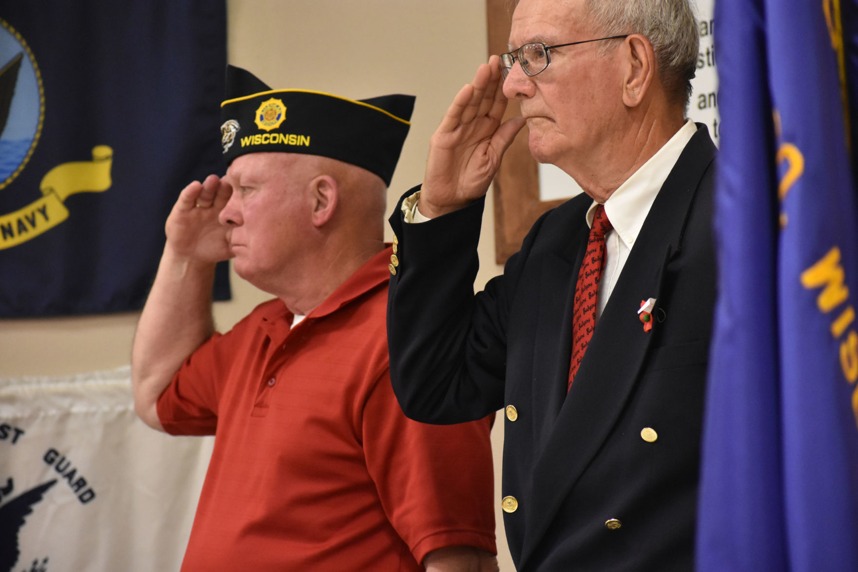 Jim Konicki and Bill Crowley salute